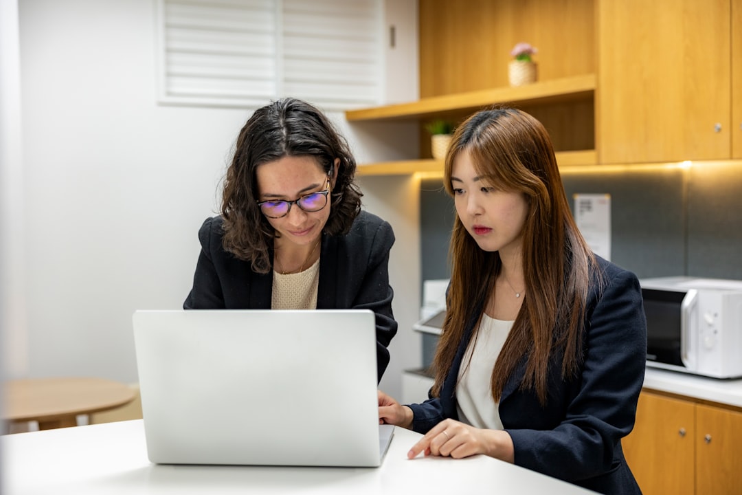 japanese office team meeting laptop