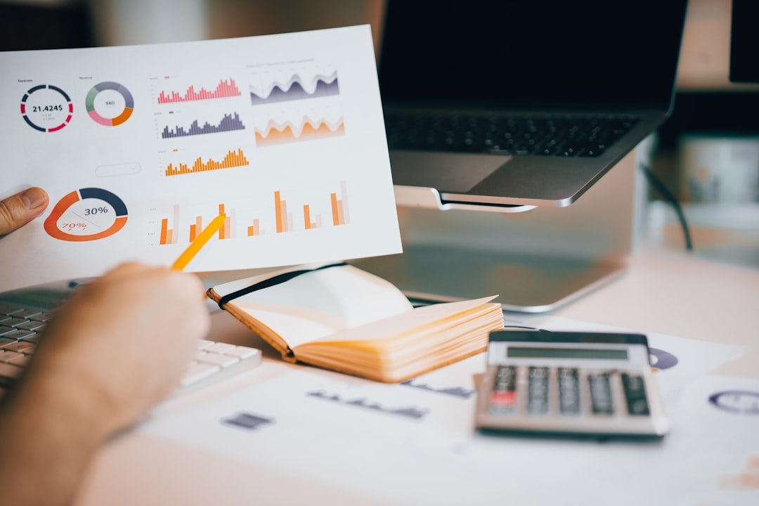 comparison chart spreadsheet office desk