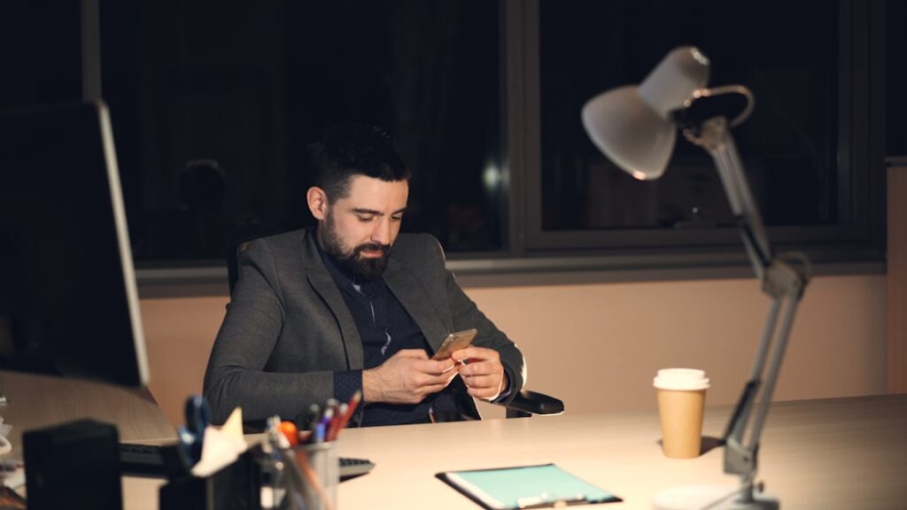 japanese businessman job consultation evening smartphone