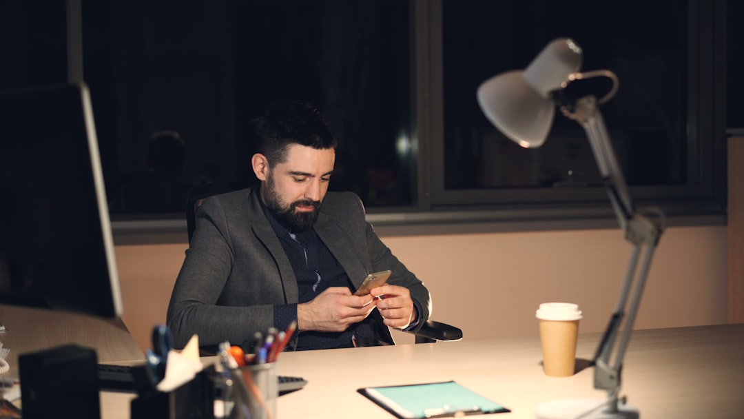japanese businessman job consultation evening smartphone