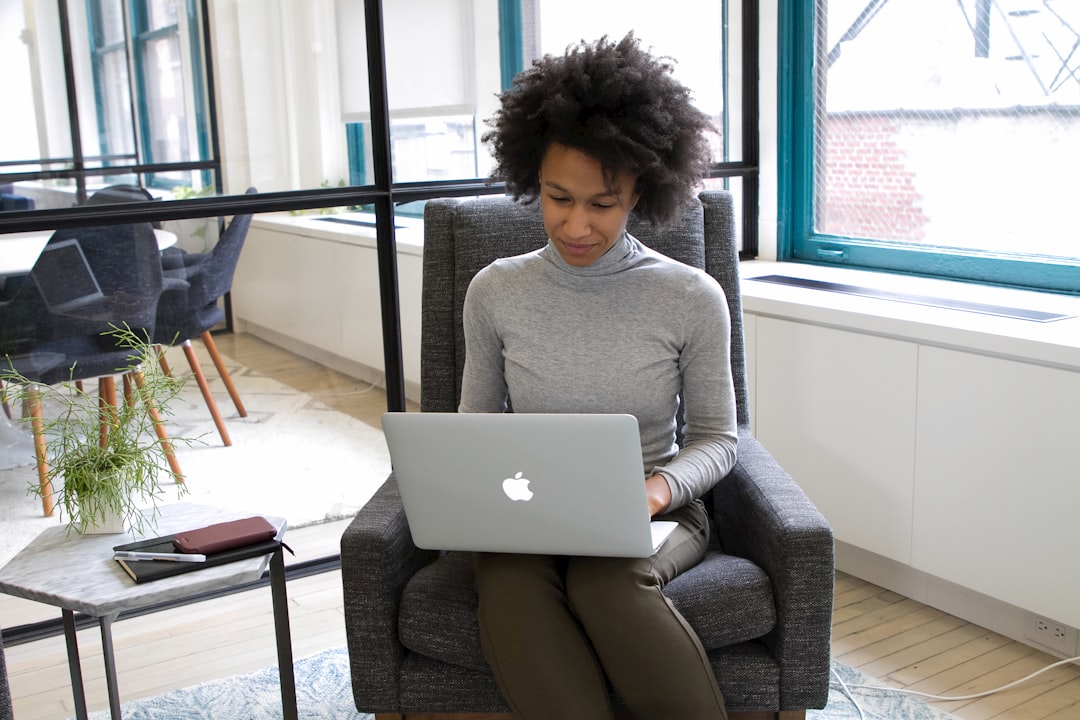 woman working laptop career change