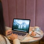 japanese woman working laptop cafe