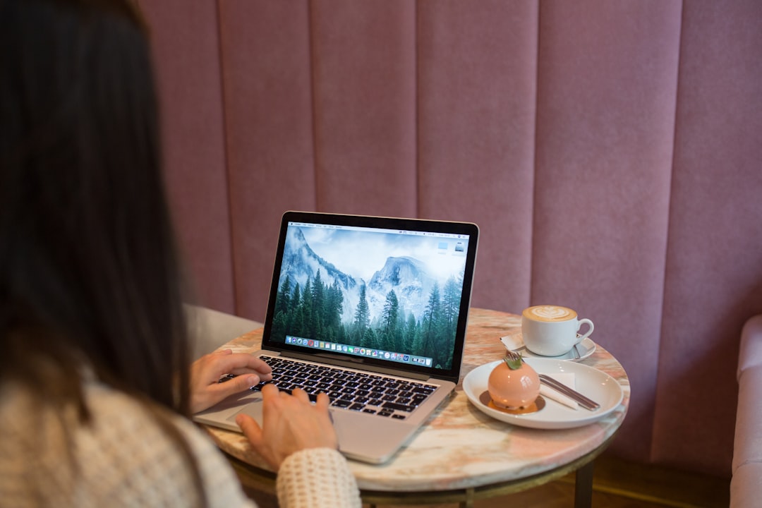 japanese woman working laptop cafe