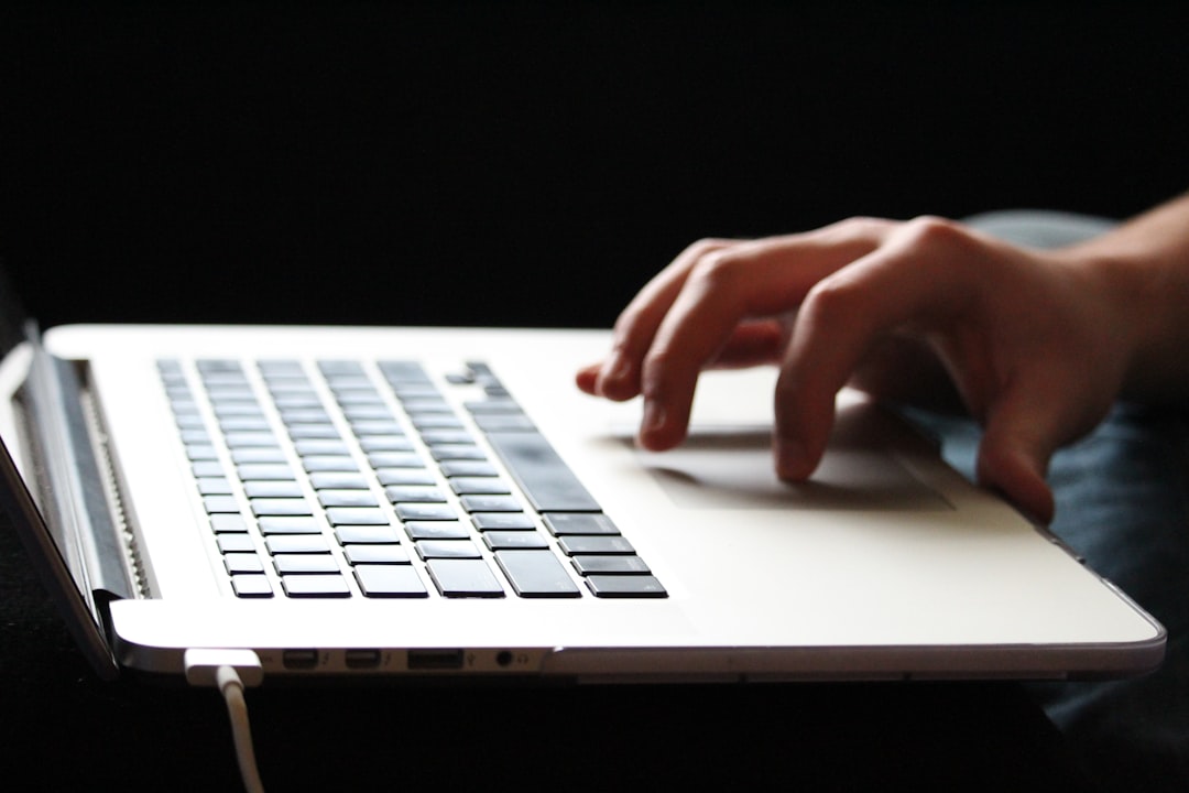person typing laptop privacy