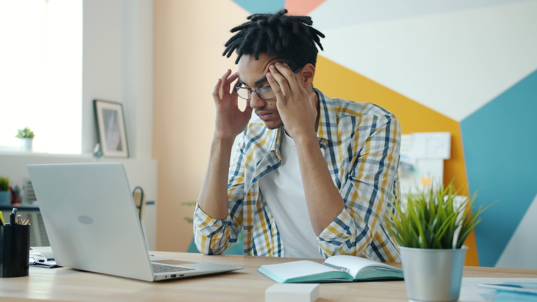 frustrated person laptop home office