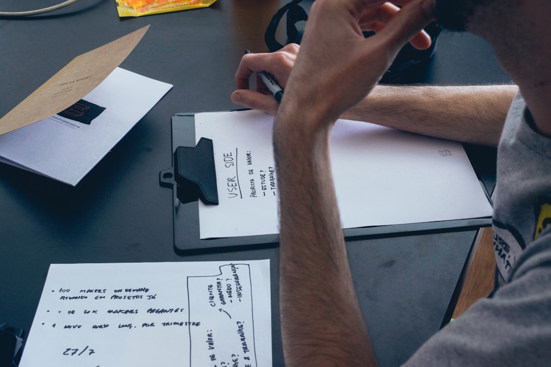 person reviewing notes coding bootcamp