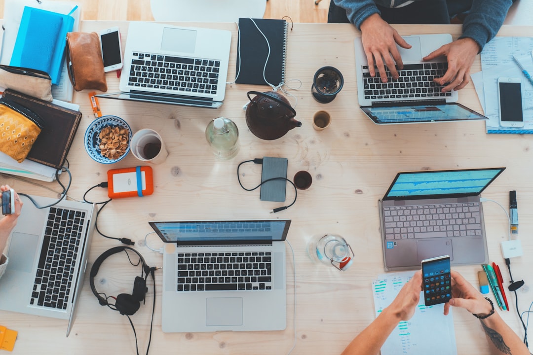 tech professionals different roles workspace