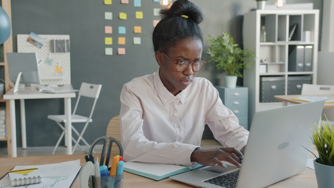 frustrated man with laptop at desk