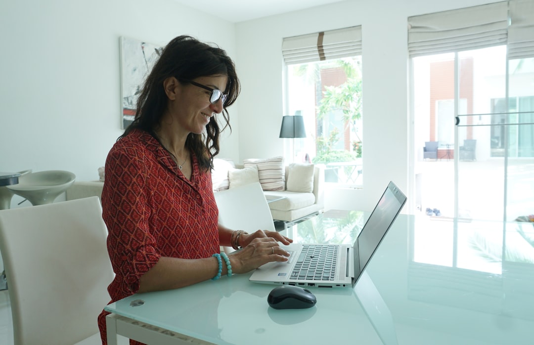 woman working laptop home office accounting