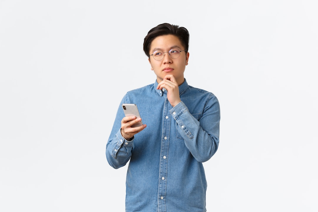 japanese man worried smartphone