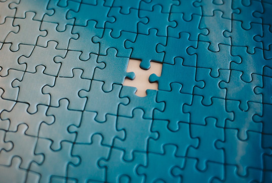 three puzzle pieces fitting together