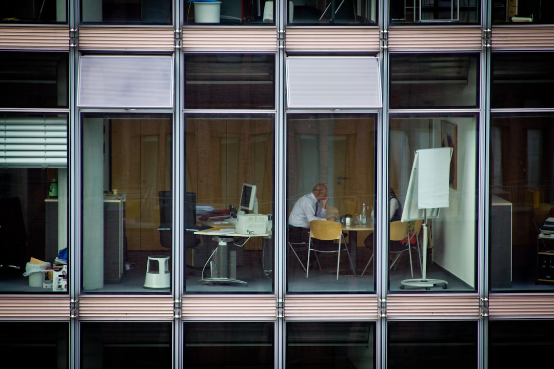 japanese businessman regret office window
