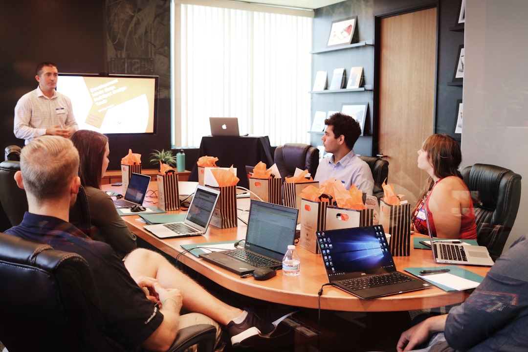 laptop networking business meeting