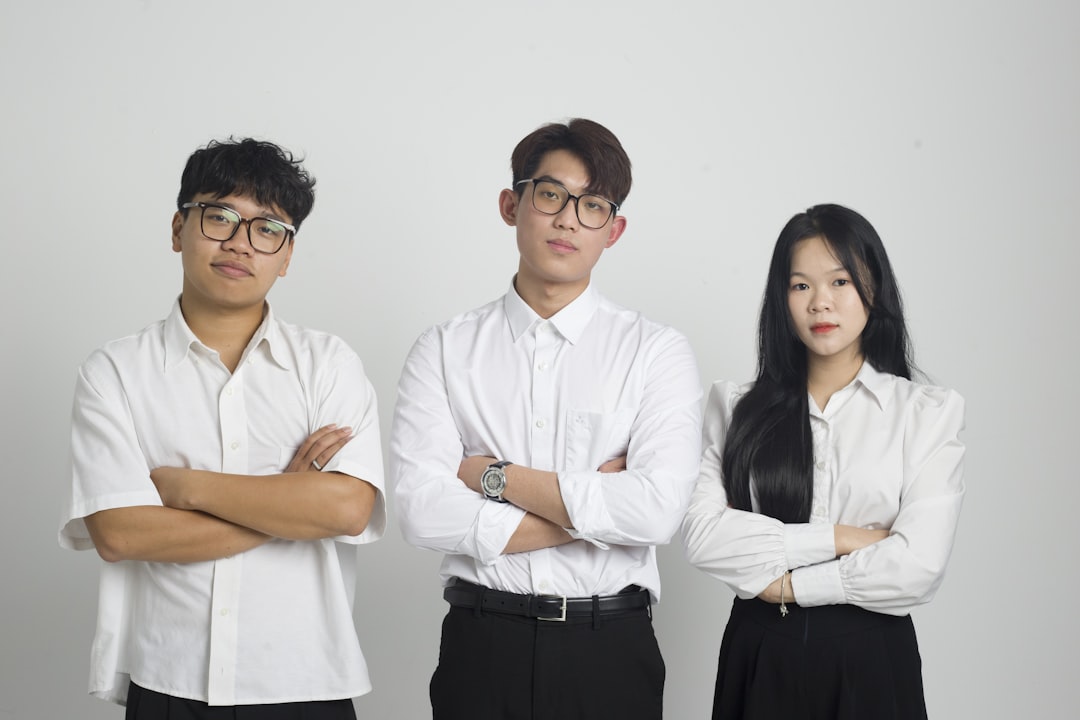 three different japanese professionals office portrait