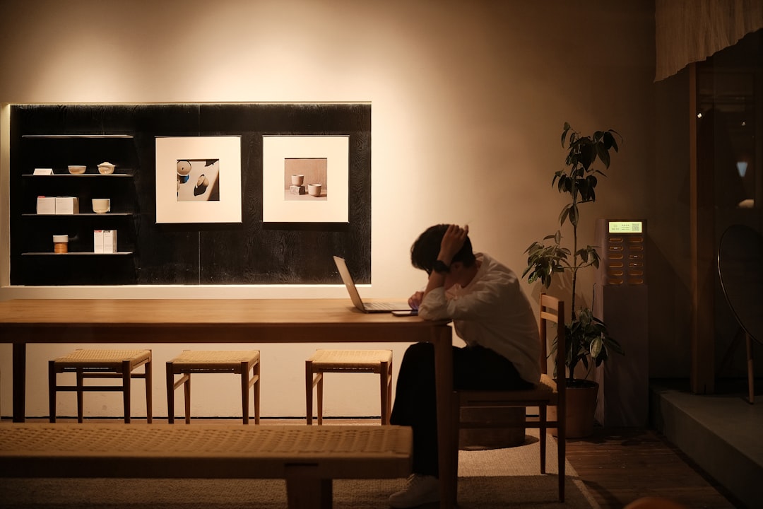tired japanese office worker late night