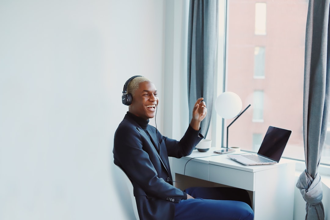 happy professional working from home office