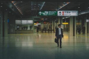 japanese businessman laptop late night decision