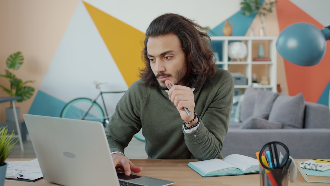 frustrated man laptop home office
