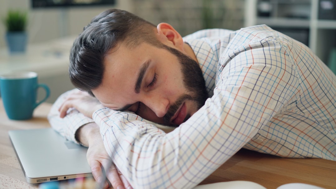 tired businessman late night laptop home