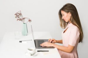woman laptop home web design study