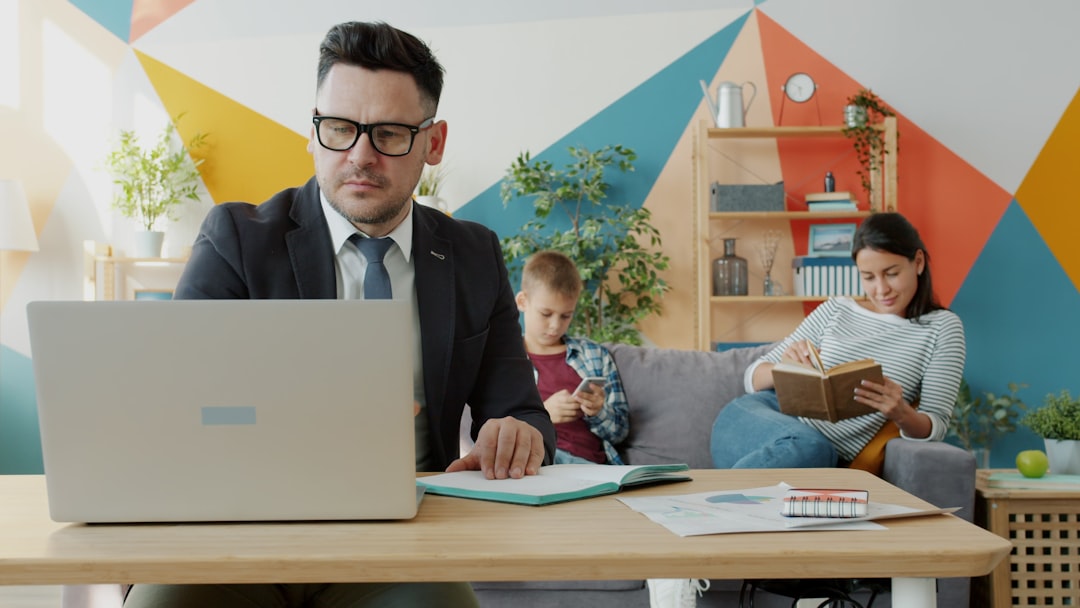 family father baby home office