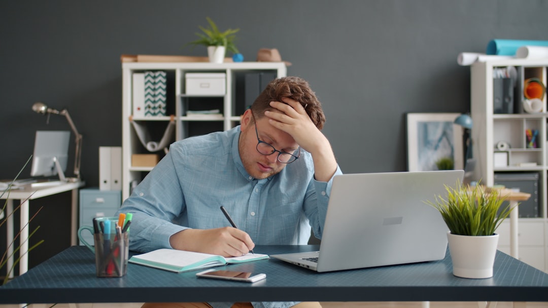 frustrated person study desk