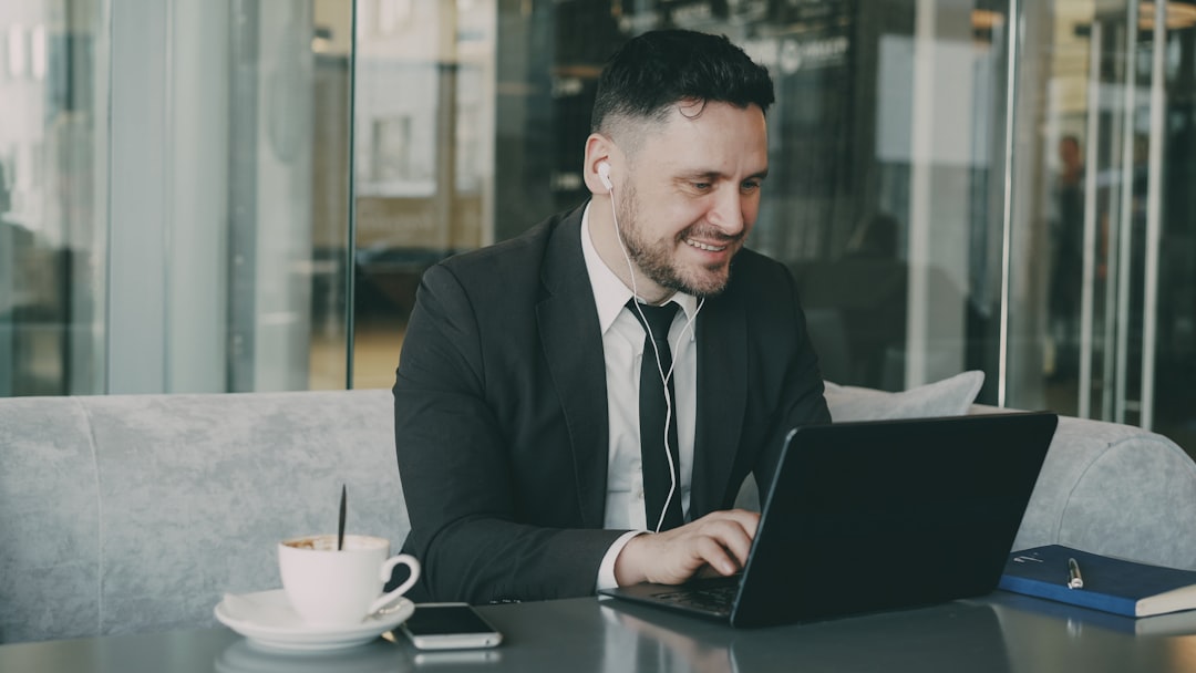 businessman success laptop confident smile