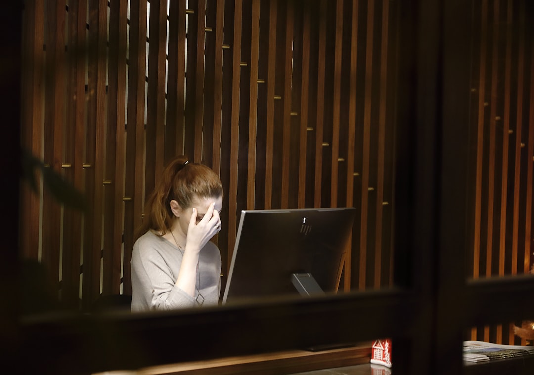 japanese woman studying laptop night