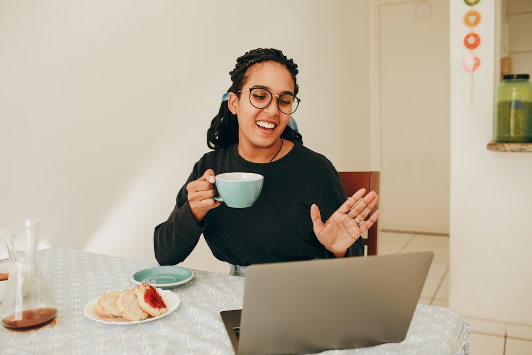 happy remote work coffee laptop