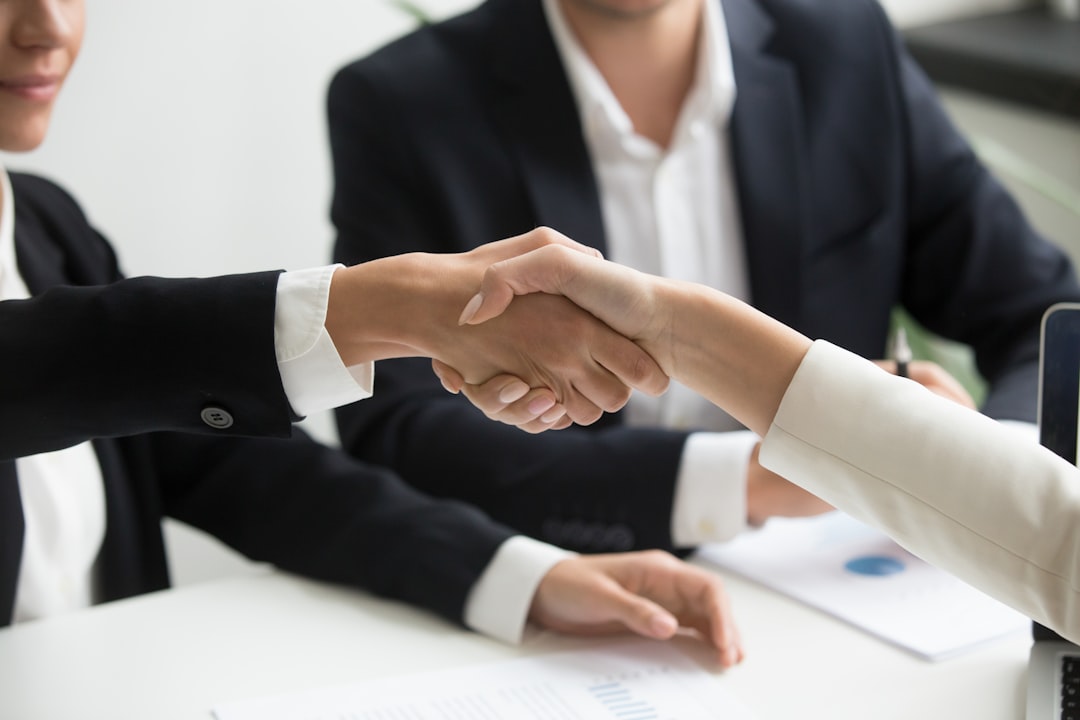 freelance client business meeting handshake