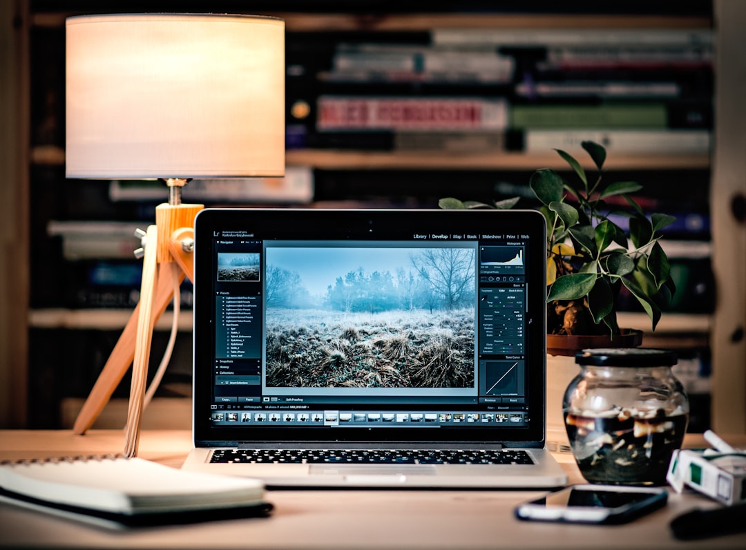freelancer video editor laptop late night