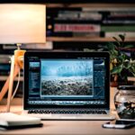 freelancer video editor laptop late night