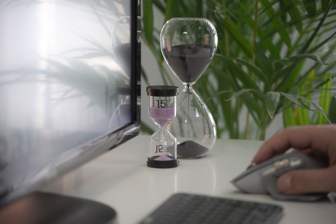 calendar and hourglass on office desk