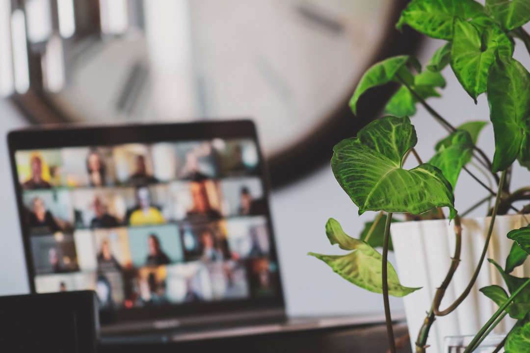 small group online meeting laptop