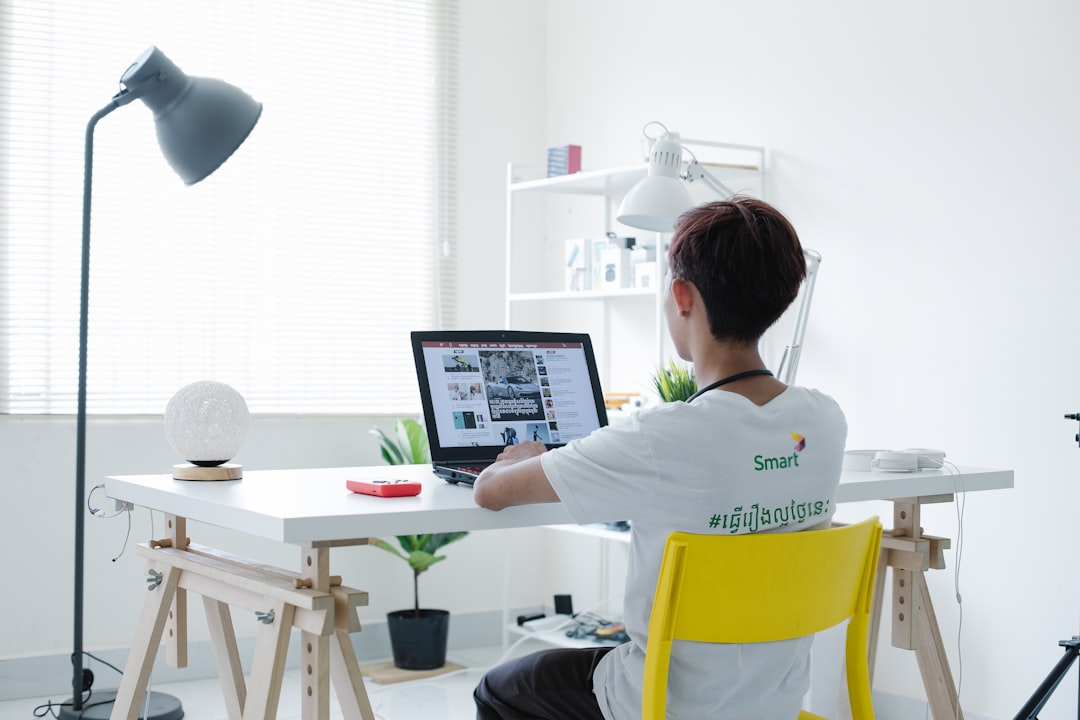 japanese man working quietly home desk