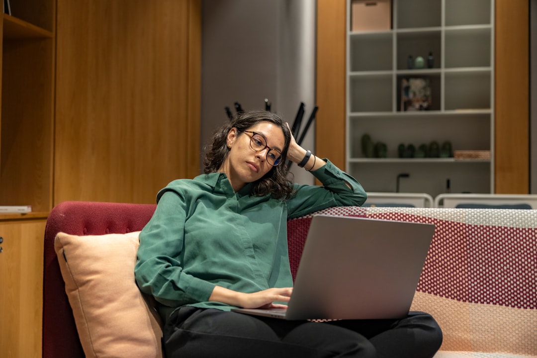 tired freelancer late night laptop