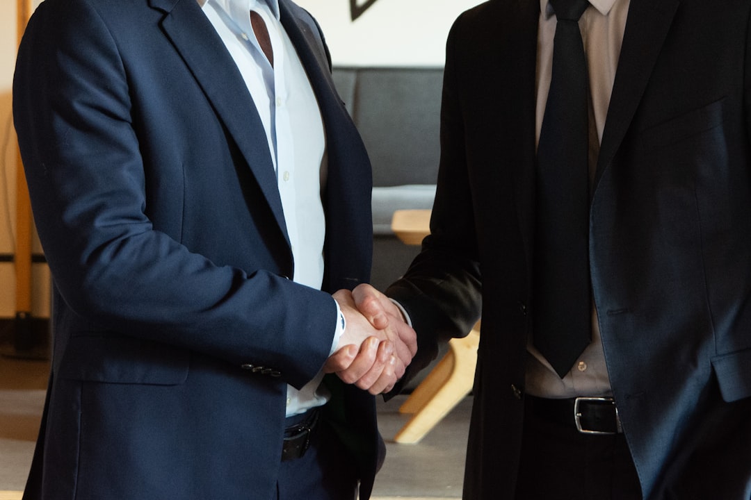 japanese man polite business handshake
