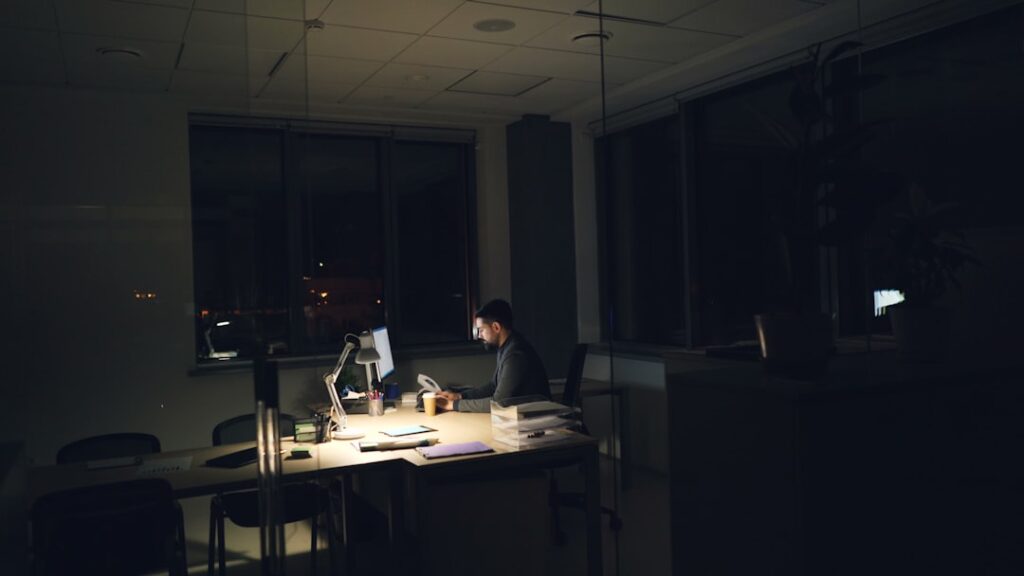 tired japanese salaryman late night office