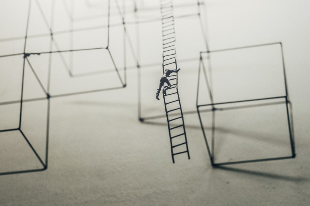 businessman climbing career ladder concept