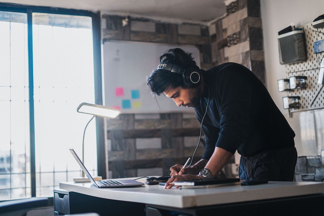 japanese businessman studying at home desk