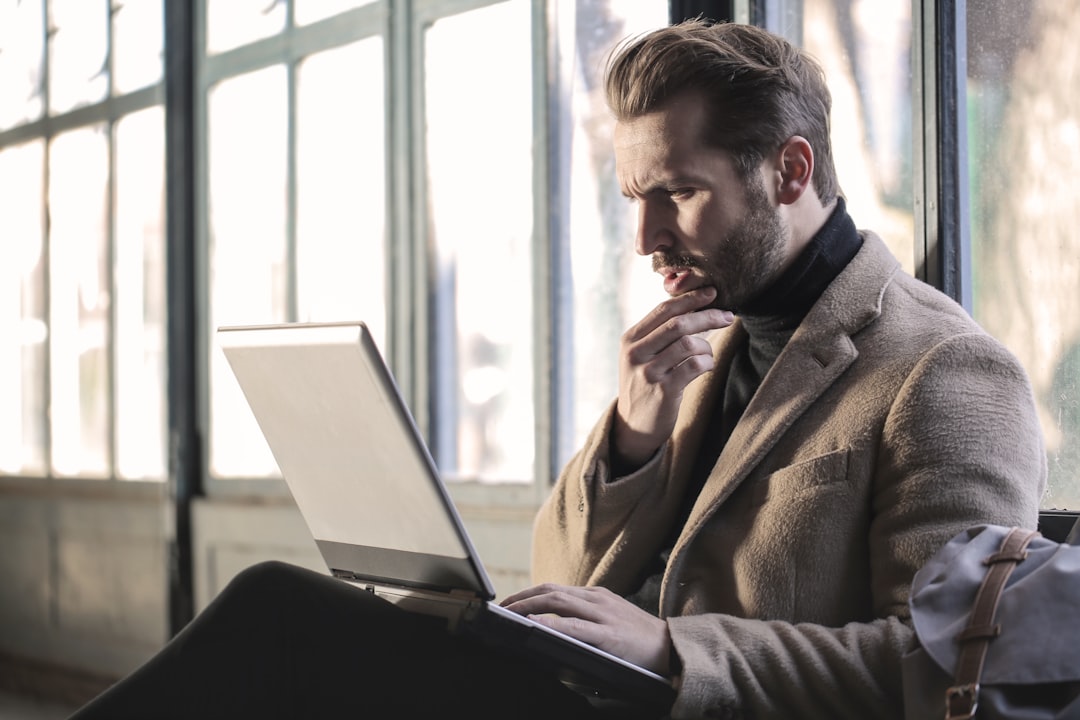 businessman online learning laptop morning