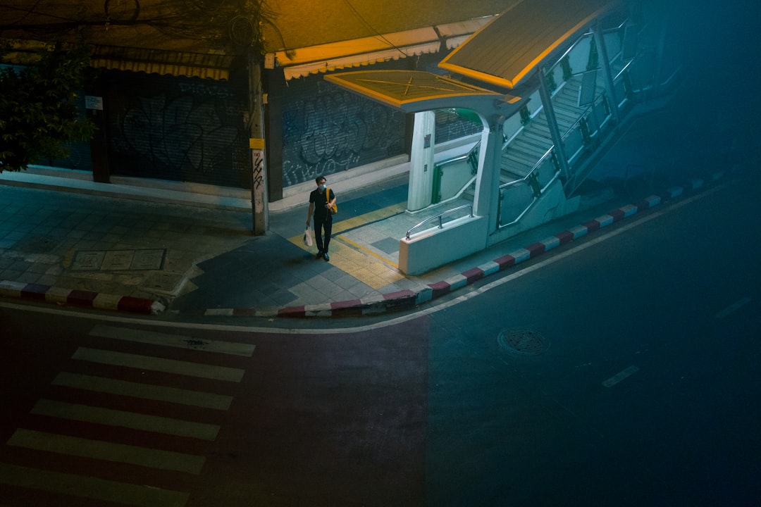 man thinking decision crossroad night