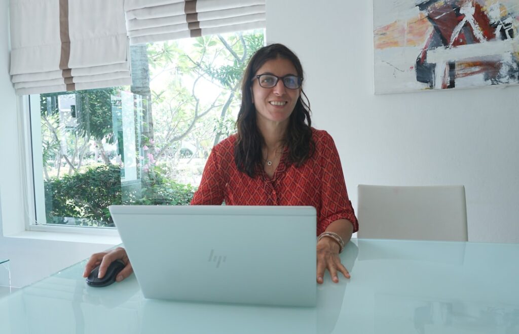 woman working laptop home desk