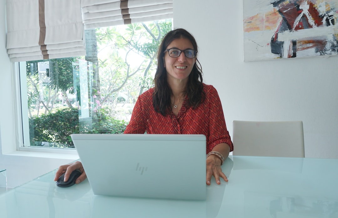 woman working laptop home desk