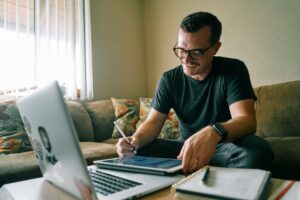 engineer working on laptop at home office