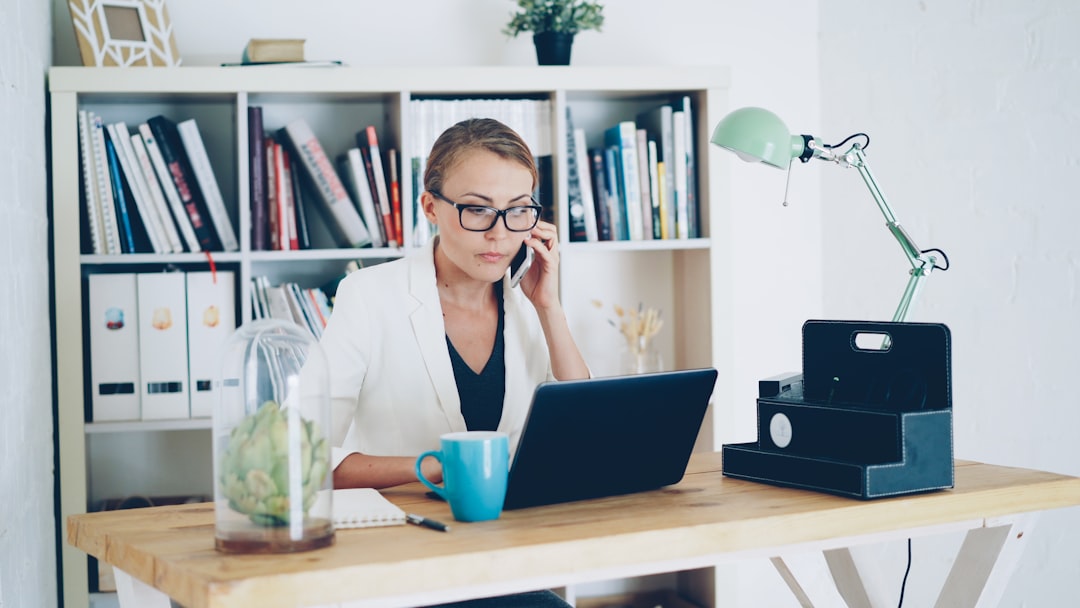frustrated woman working laptop home desk