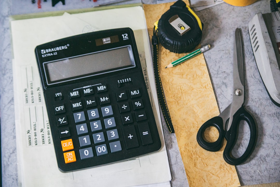 tax documents calculator paperwork desk