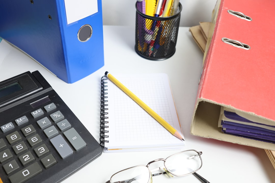 tax documents and calculator on desk