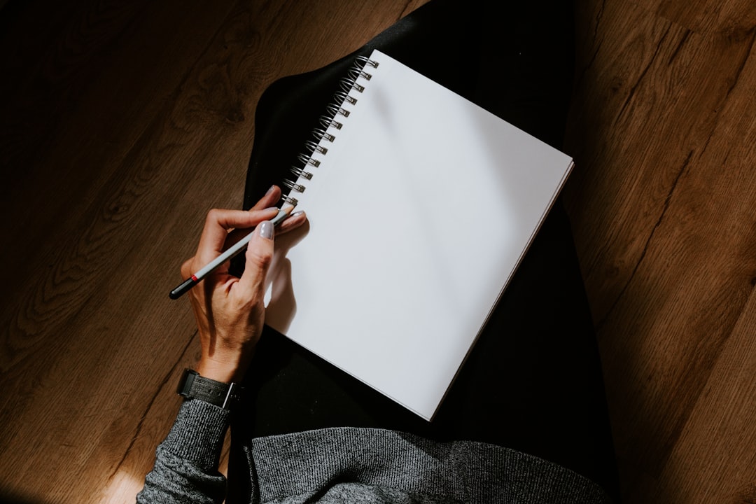 person balancing work life planning notebook