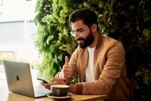 office worker learning laptop confident